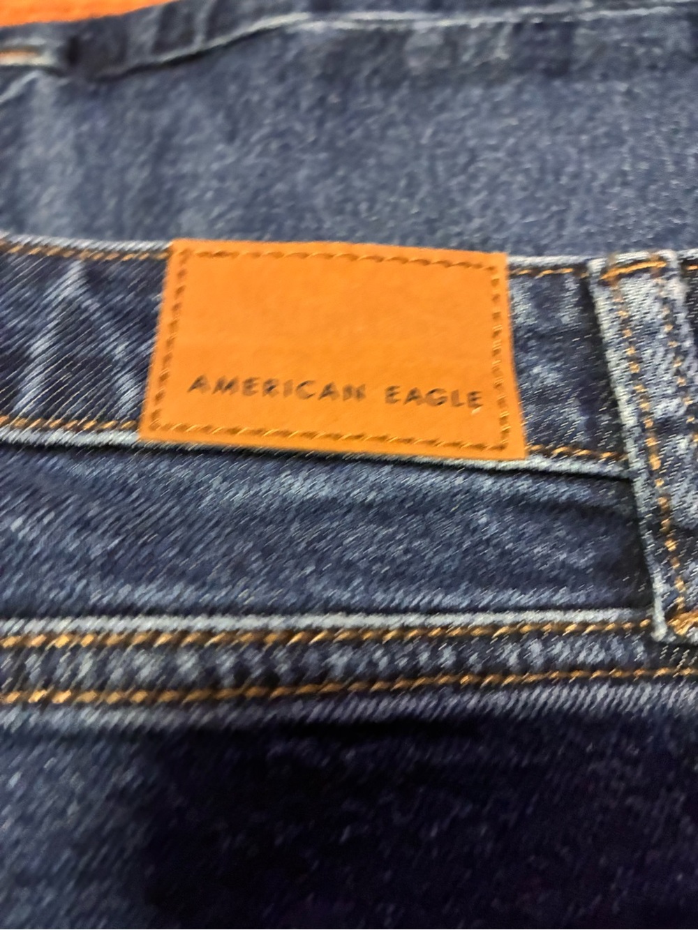 American Eagle Outfitters Slim Men’s Jeans in Dark Blue with Tan Patch